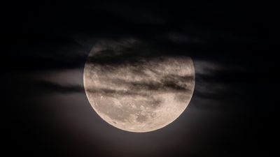 Moon Behind the Clouds