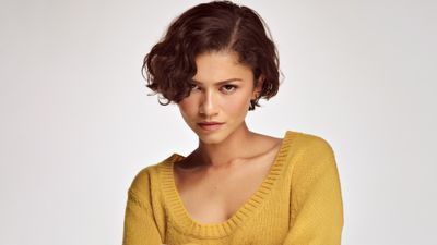 4K UHD Zendaya Prada photoshoot portrait wallpaper on a white background, high-resolution celebrity desktop background.