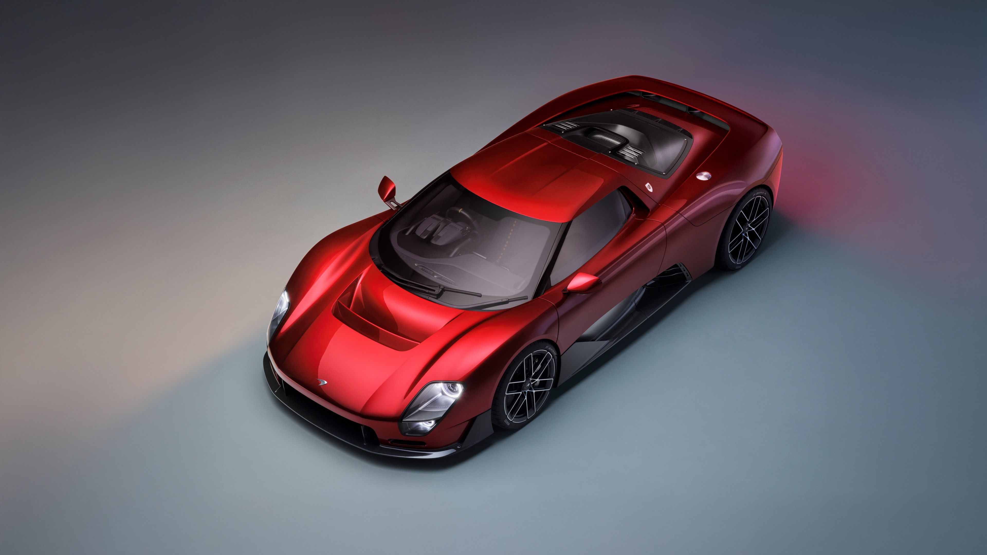 4K UHD McLaren McL 6GT red supercar wallpaper, high-resolution automotive desktop background.