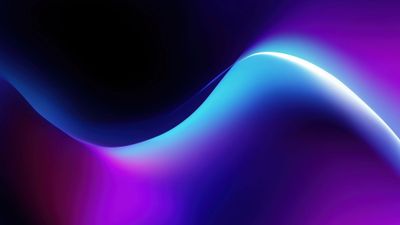A vibrant 4K wallpaper showcasing a fluid wave of colorful gradients blending seamlessly from deep purples to bright blues. The striking interplay of light and color creates a mesmerizing, luminous effect, highlighting the smooth curves and adding a sense of motion and depth.