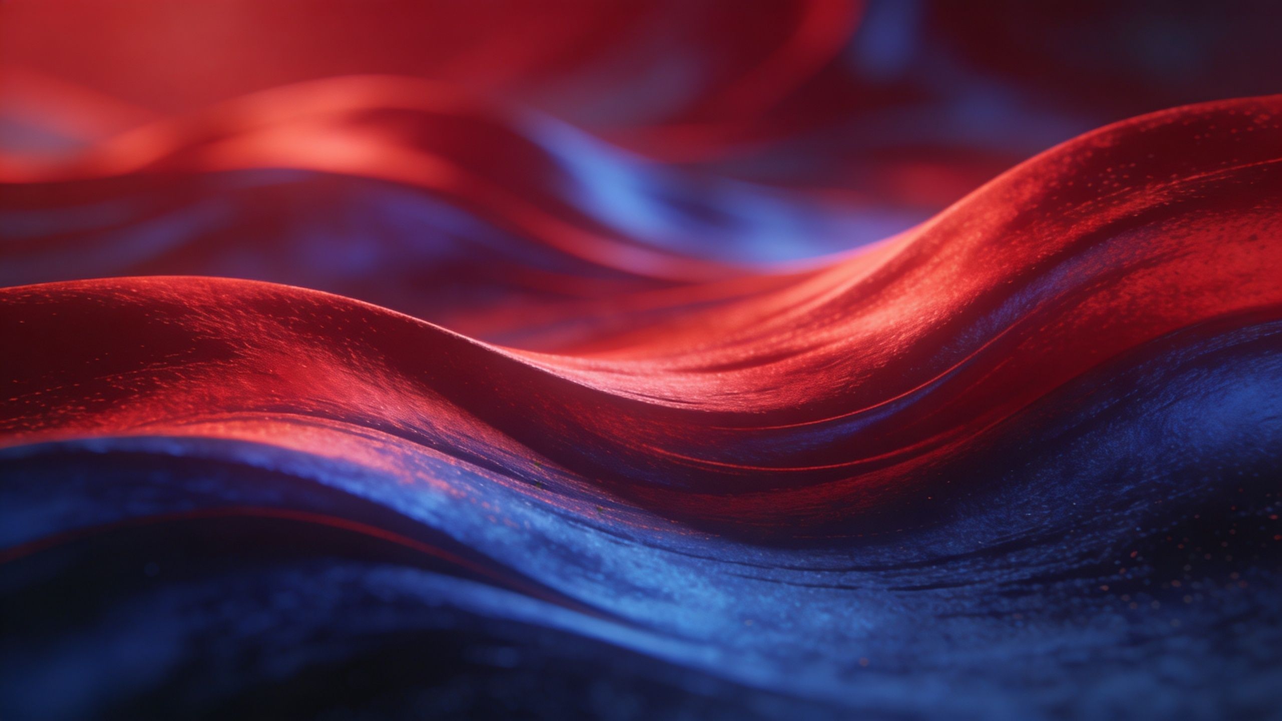 Vibrant red and blue abstract waves create a dynamic and fluid pattern, evoking a sense of movement and energy. The rich colors blend seamlessly, giving the image a lively and immersive atmosphere.