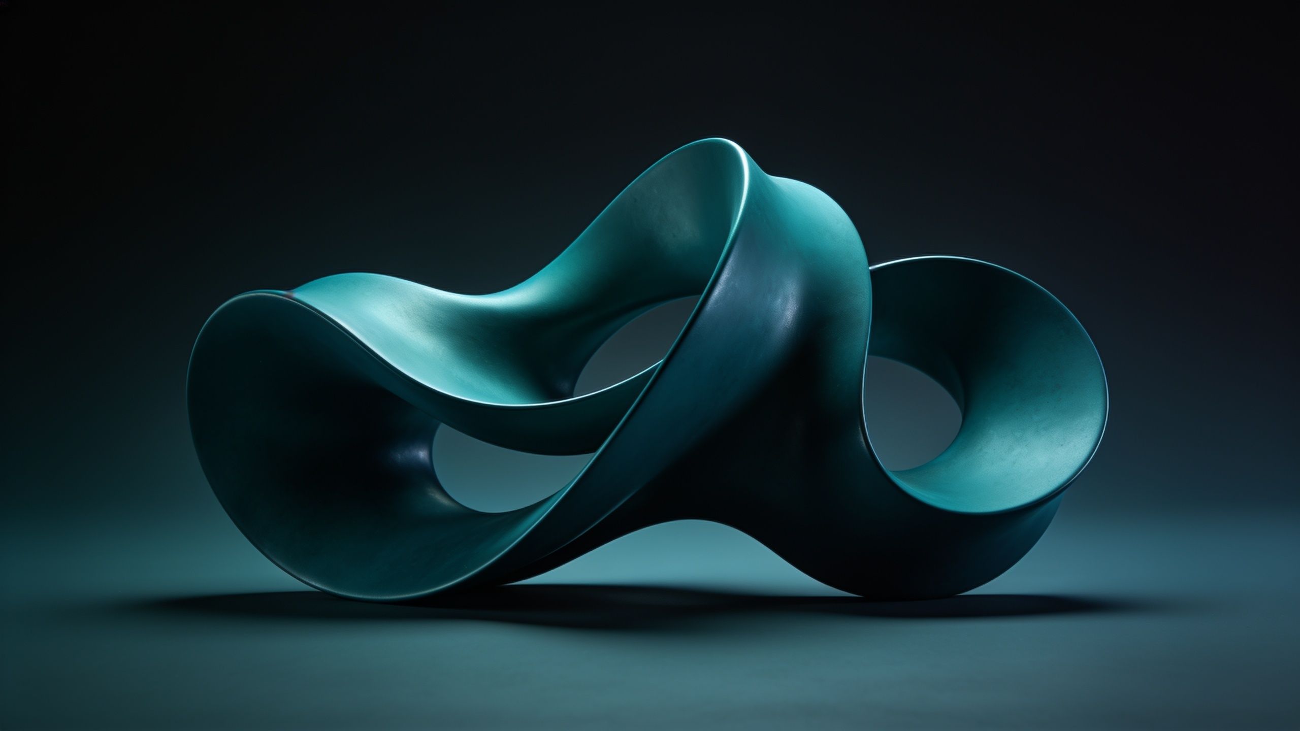An abstract sculpture with smooth, flowing curves in teal hues is set against a dark, gradient background, creating a serene and sophisticated mood.