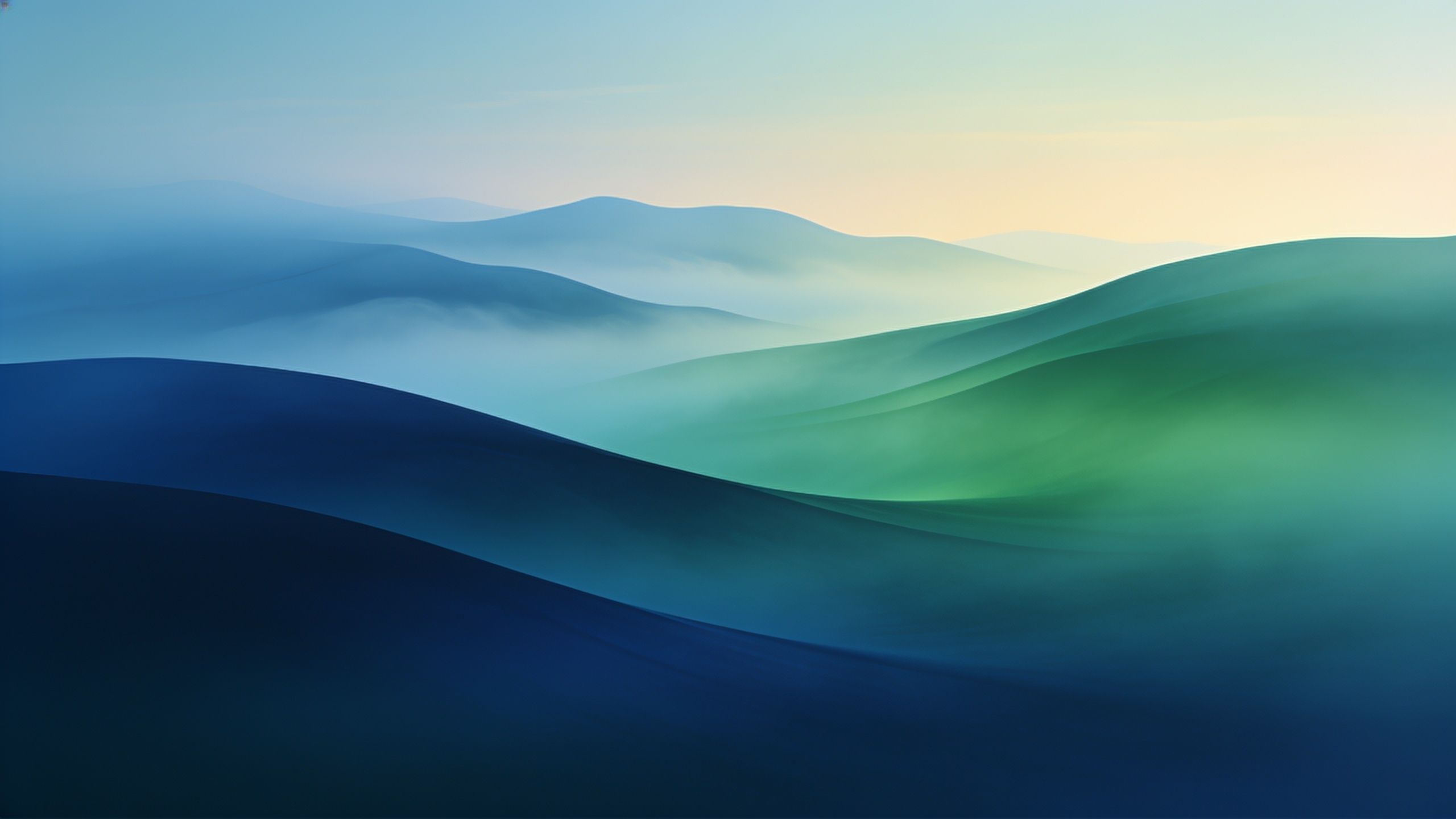 A tranquil landscape of mist-covered hills bathed in the soft light of dawn, featuring gentle gradients of blue and green that create a serene and calming atmosphere.