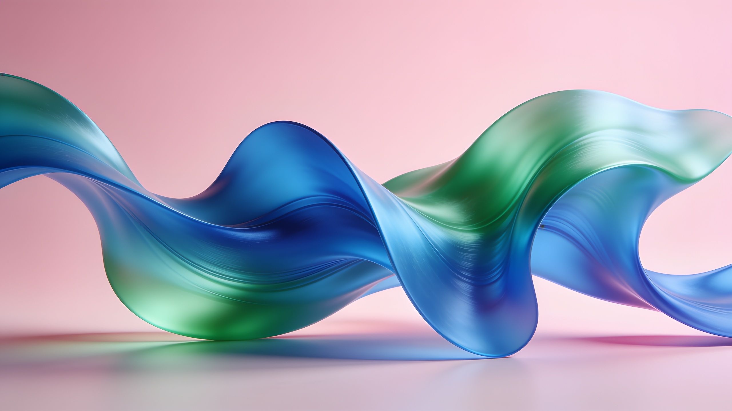 Abstract waves in vibrant shades of blue and green flow gracefully across a soft pink background, creating a dynamic and calming visual effect.
