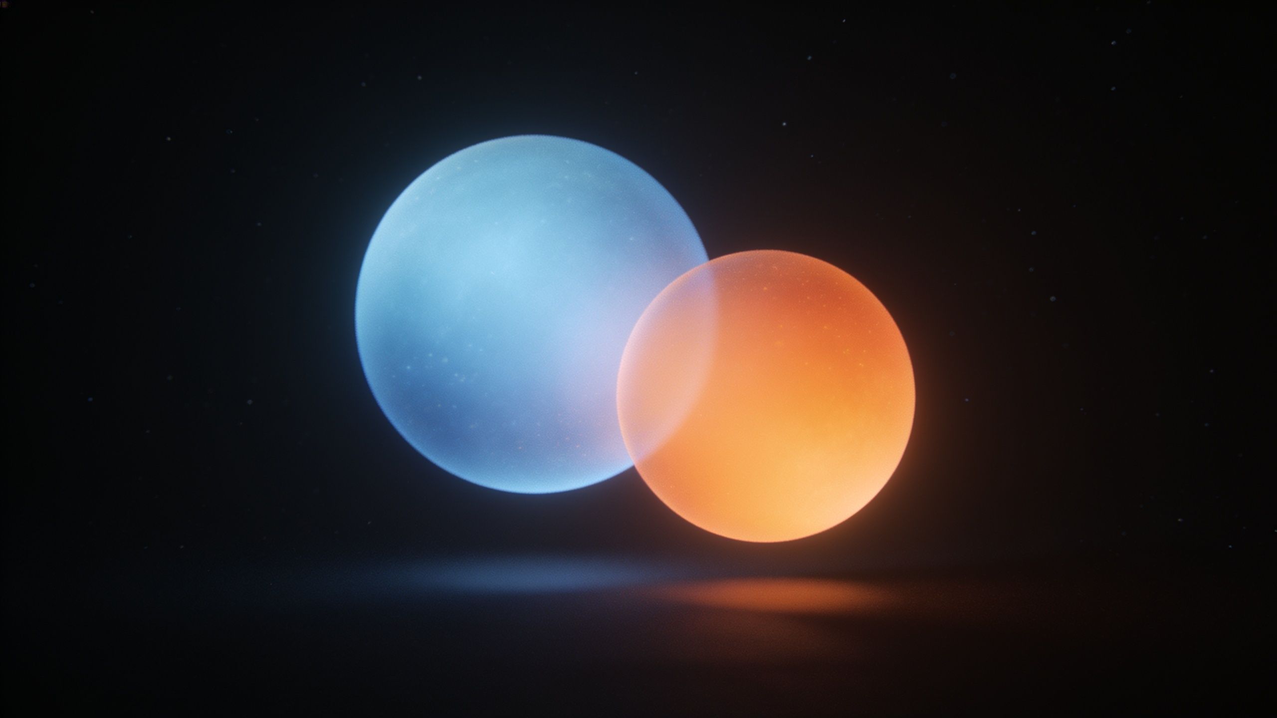 Two luminous spheres, one blue and one orange, float closely together in a dark, star-speckled space, creating an ethereal and serene atmosphere.