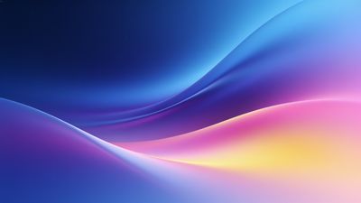A dynamic abstract wallpaper featuring smooth, flowing waves of vibrant gradient colors transitioning from deep blues to bright pinks and yellows, creating a serene and energetic mood.