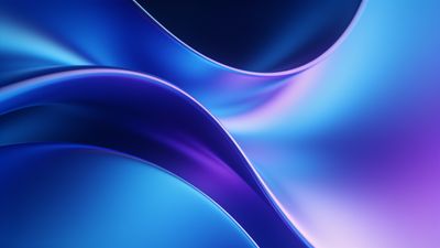 An abstract wallpaper featuring smooth, flowing waves in shades of blue and purple, creating a calming and elegant visual effect with a sense of depth and movement.