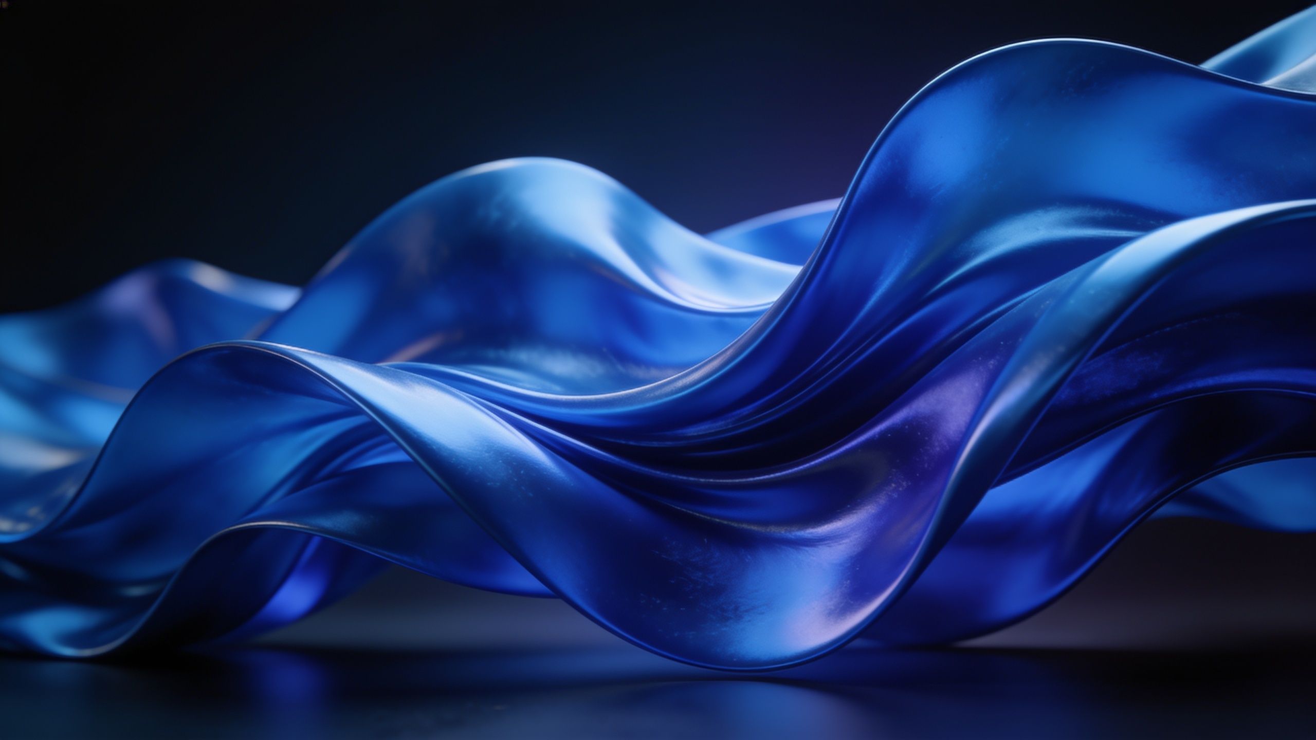 A dynamic wallpaper featuring smooth, flowing blue waves with a glossy texture, set against a dark background, creating a serene and elegant atmosphere.