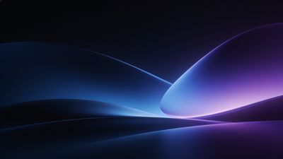 Abstract waves in shades of blue and purple flow smoothly across the image, creating a serene and elegant atmosphere with a sense of depth and fluidity.