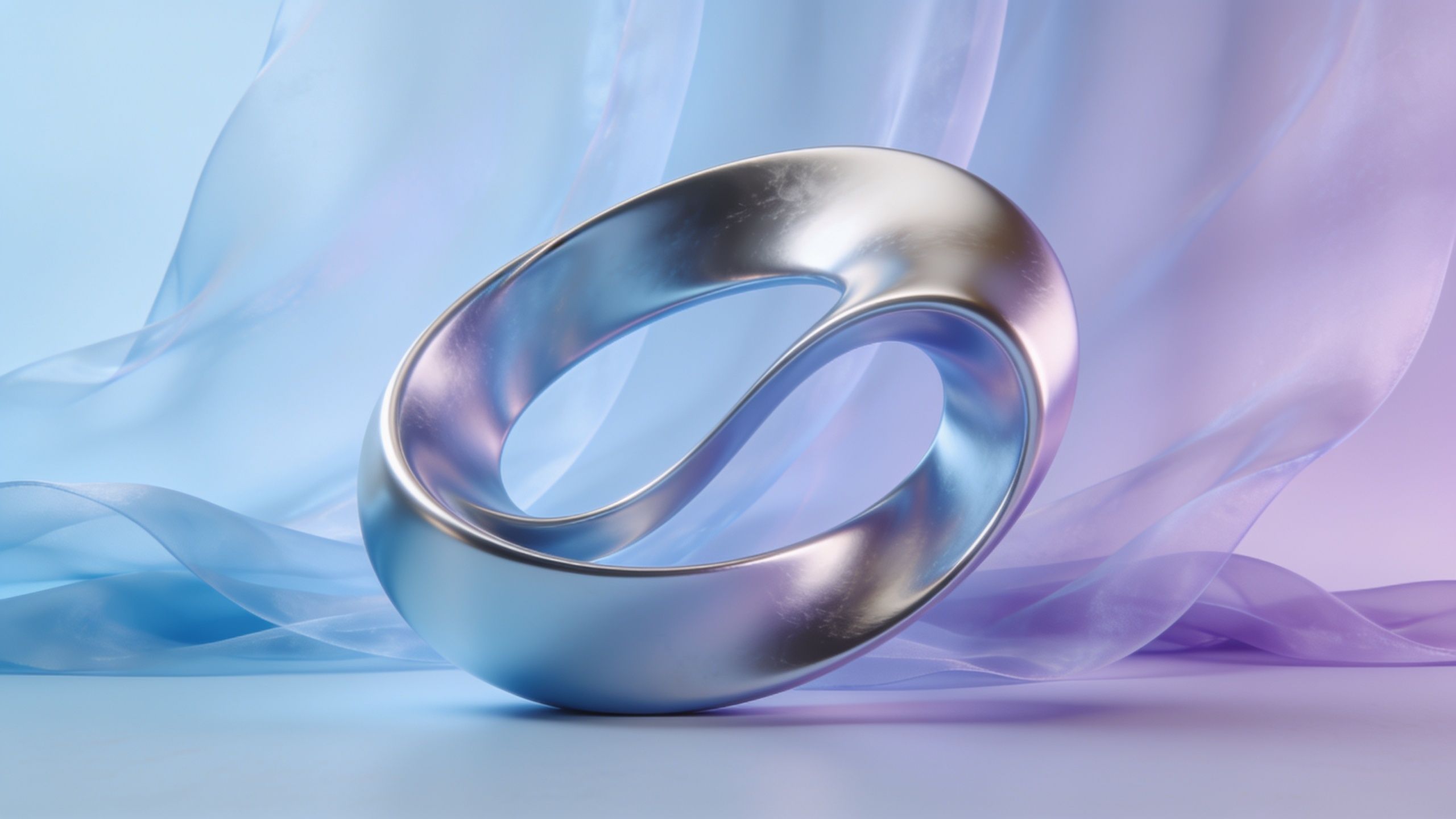 A sleek, metallic infinity symbol rests elegantly against a backdrop of soft pastel waves in shades of blue and purple, creating a serene and sophisticated atmosphere.