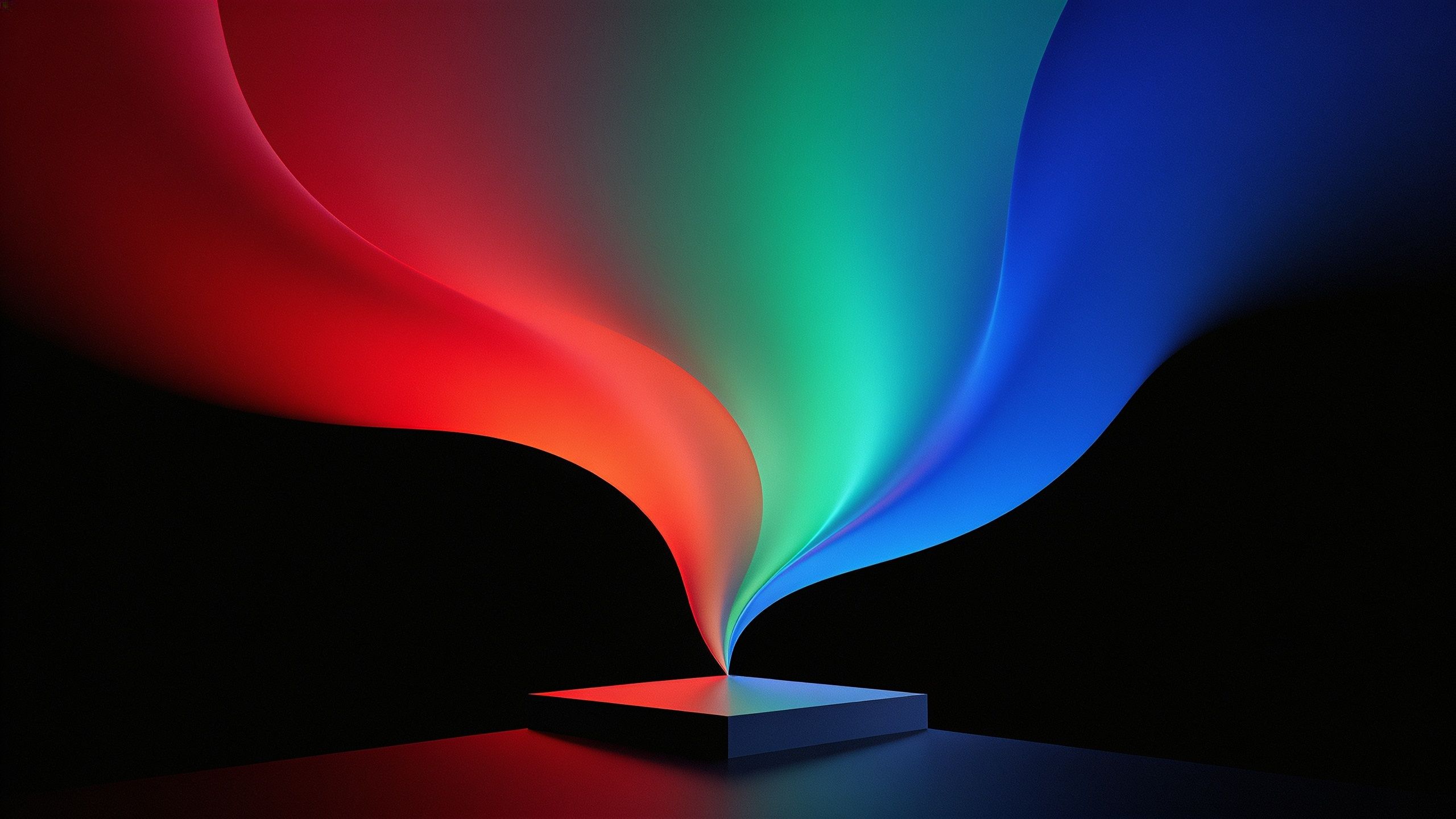 Abstract art wallpaper featuring vibrant, flowing waves of red, green, and blue emerging from a central point on a dark background, creating a dynamic and energetic mood.