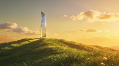 A glass monolith stands atop a grassy hill, reflecting the warm hues of a serene sunset sky filled with soft clouds, creating a tranquil and ethereal atmosphere.