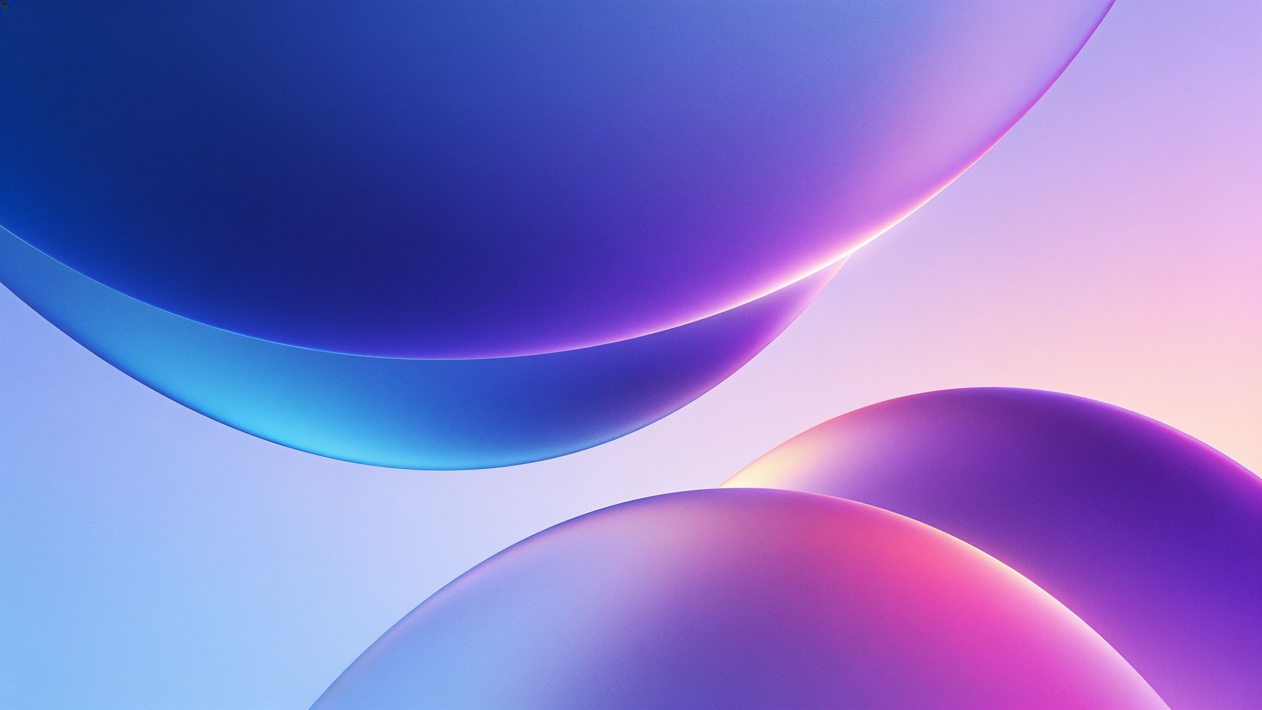 A collection of vibrant gradient spheres in shades of blue, purple, and pink float against an abstract, softly blurred background, creating a serene and futuristic mood.
