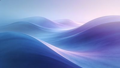 A tranquil scene of smooth, blue waves gently rolling under the soft light of dawn, creating a serene and calming atmosphere with hints of pink and purple in the sky.