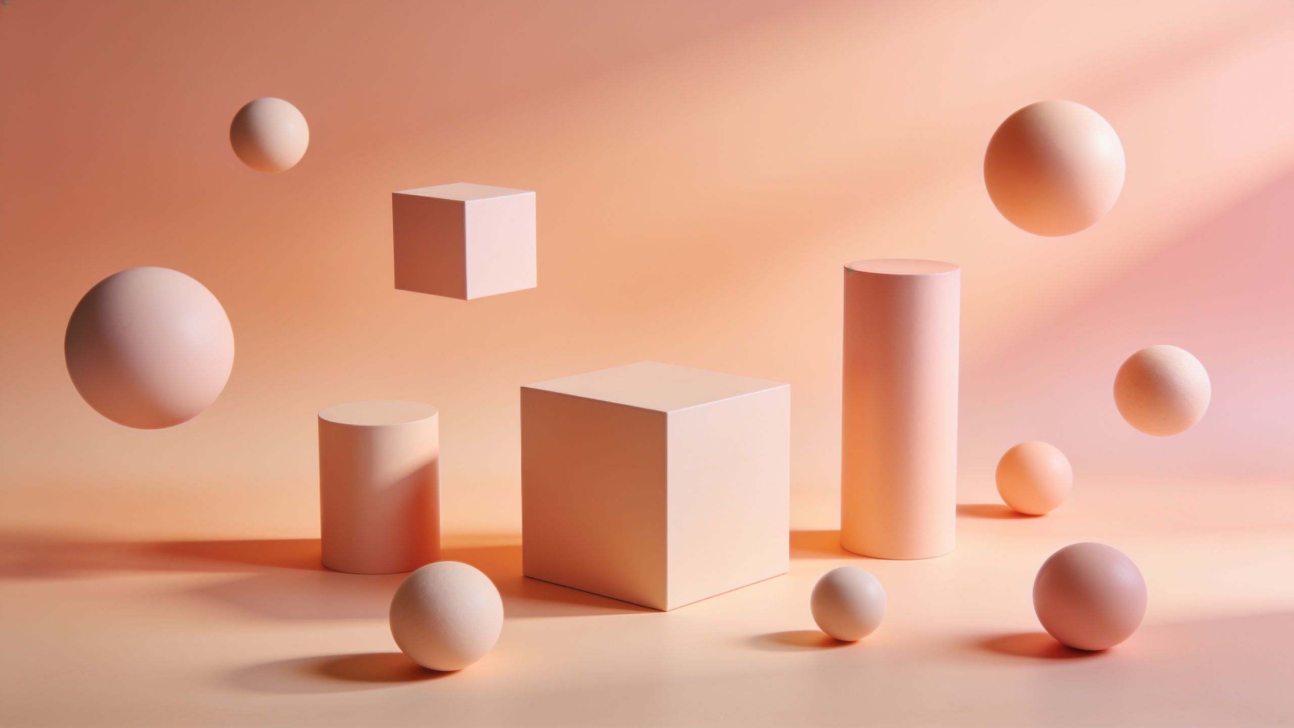 Floating geometric shapes, including spheres, cubes, and cylinders, are arranged against a soft pastel gradient background of peach and pink, creating a serene and dreamy atmosphere.