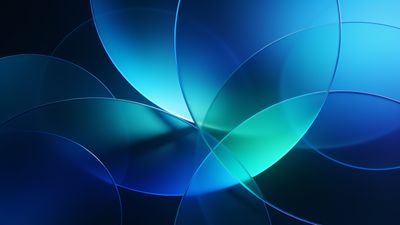 An abstract design featuring overlapping translucent circles in varying shades of blue and teal, creating a serene and harmonious mood.