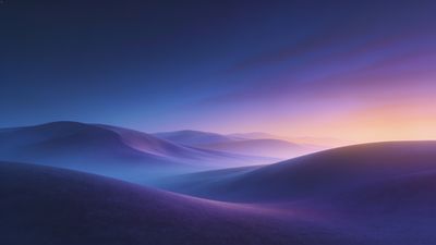 A serene twilight scene unfolds over gently rolling hills bathed in soft purple and blue hues, with a warm glow on the horizon creating a tranquil and calming atmosphere.