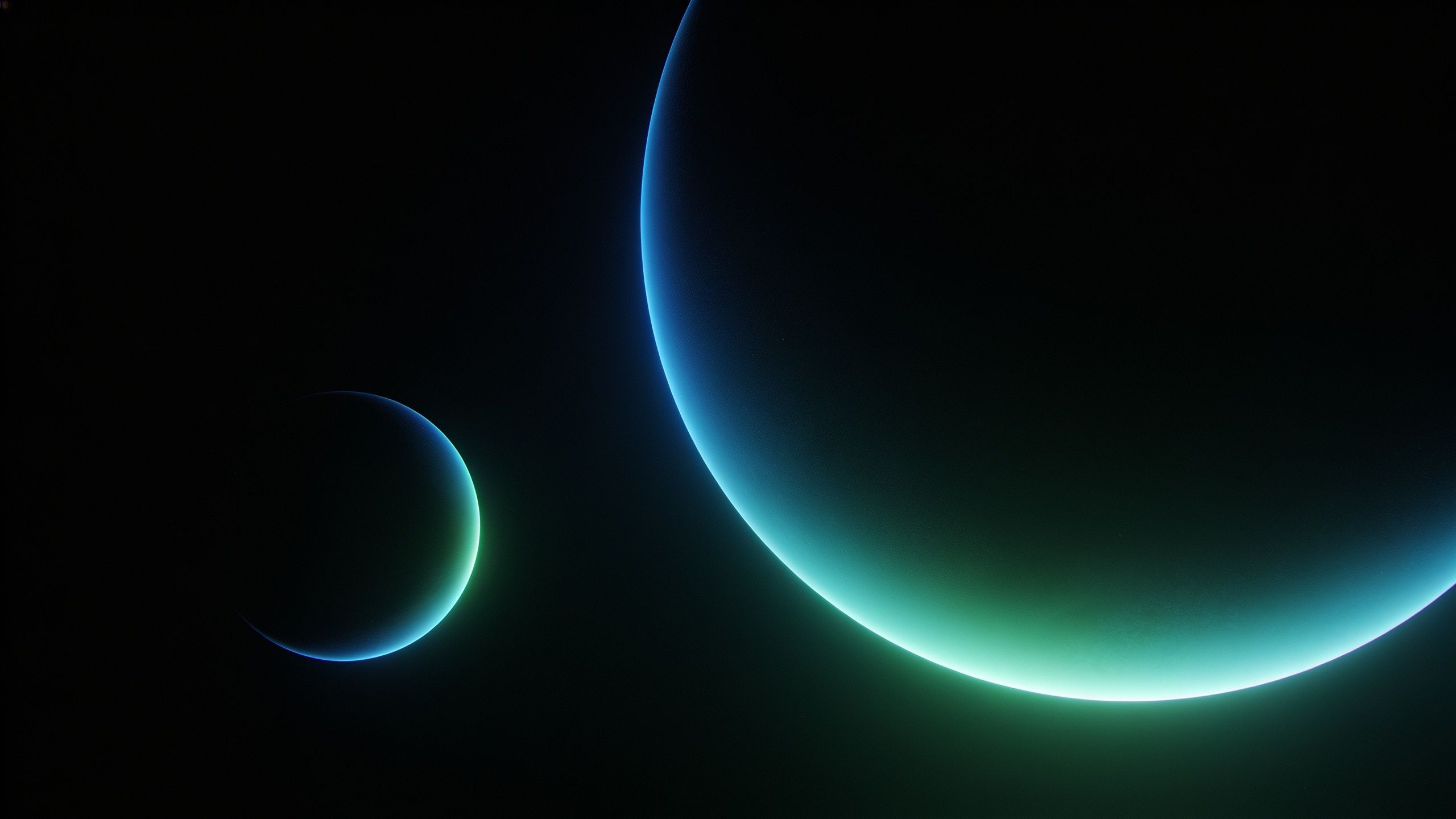 A digital wallpaper depicting two distant planets with a soft, ethereal glow in shades of blue and green against a dark, starless background, creating a serene and otherworldly atmosphere.