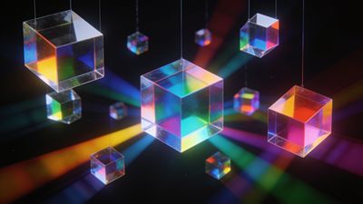 Floating transparent cubes refract vibrant rainbow colors against a dark background, creating a dynamic and luminous atmosphere.