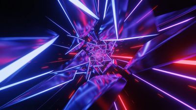 A dynamic scene of vibrant neon shards in motion, featuring sharp, angular shapes in vivid blue, purple, and red hues, creating a sense of speed and energy against a dark background.