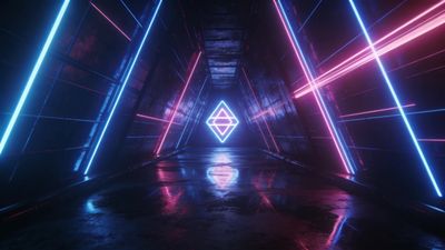 A futuristic tunnel is illuminated by vibrant neon lights in shades of blue and pink, forming geometric patterns along the walls and ceiling, creating a sleek and immersive sci-fi atmosphere. The reflective floor enhances the glowing effect, adding depth and a sense of infinite space.
