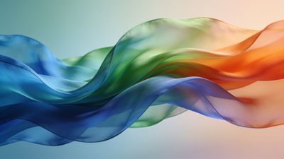 A vibrant display of flowing silk waves in shades of blue, green, and orange creates a dynamic and soothing visual, evoking a sense of fluidity and elegance against a softly blurred background.