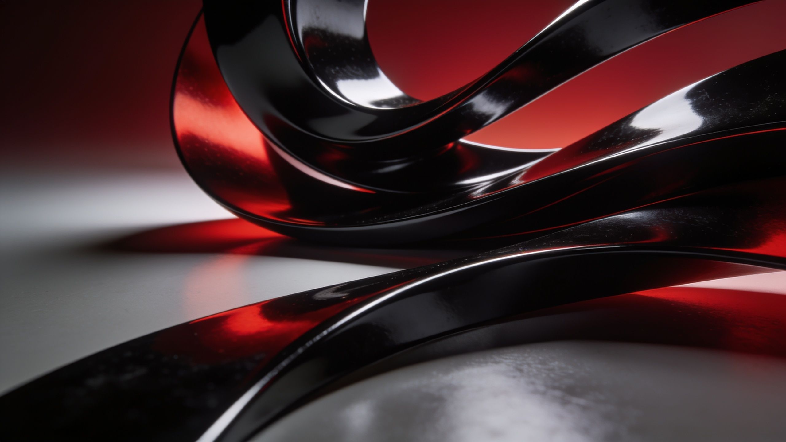 A sleek abstract wallpaper featuring glossy black and red curves intertwining against a gradient background, creating a modern and dynamic visual with a sophisticated and energetic mood.