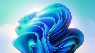 A digital artwork featuring smooth, flowing abstract waves in varying shades of blue and teal, creating a calming and serene atmosphere against a softly illuminated background.