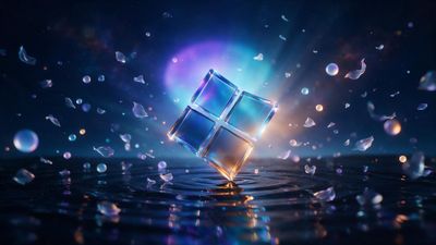 A glass Windows 11 logo of four glowing cubes hovers above rippling water at night, encircled by floating iridescent petals and orbs. The cool blue-violet light and gentle reflections create a futuristic, tranquil mood.