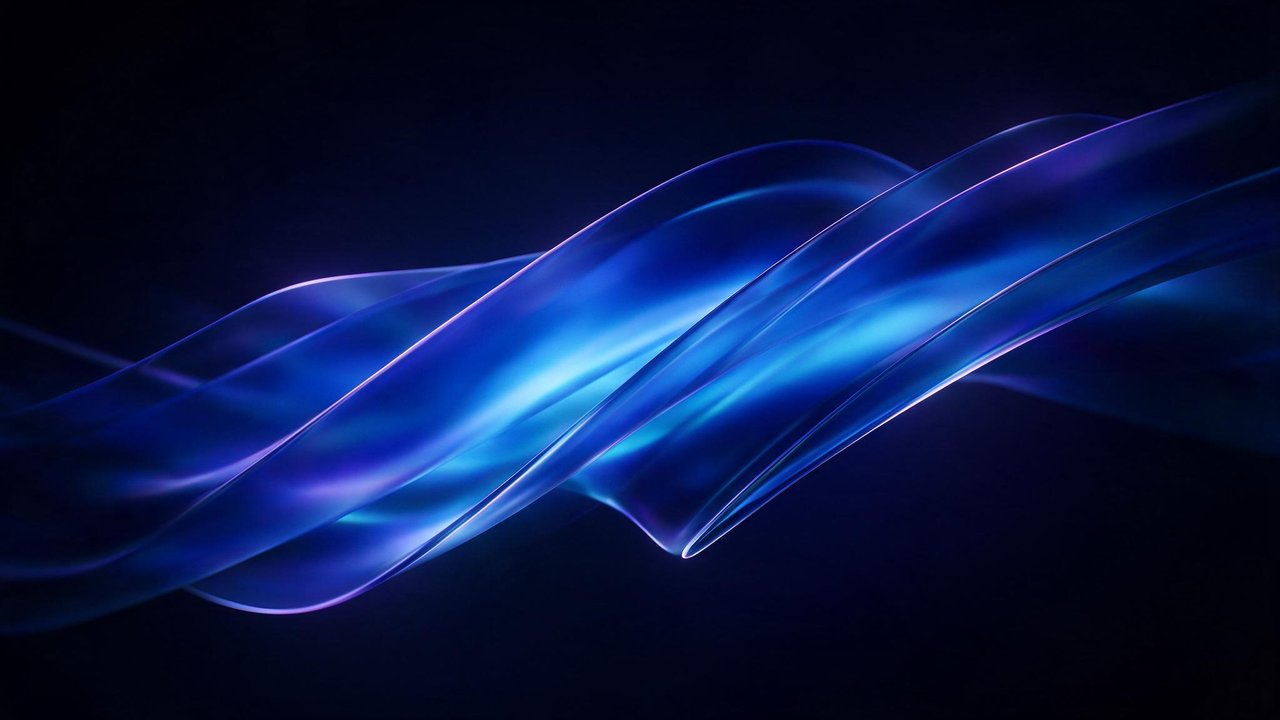 Translucent blue and violet ribbons flow diagonally across a dark canvas, forming the signature Windows 11 bloom shape. The smooth curves and deep hues create a calm, futuristic mood.