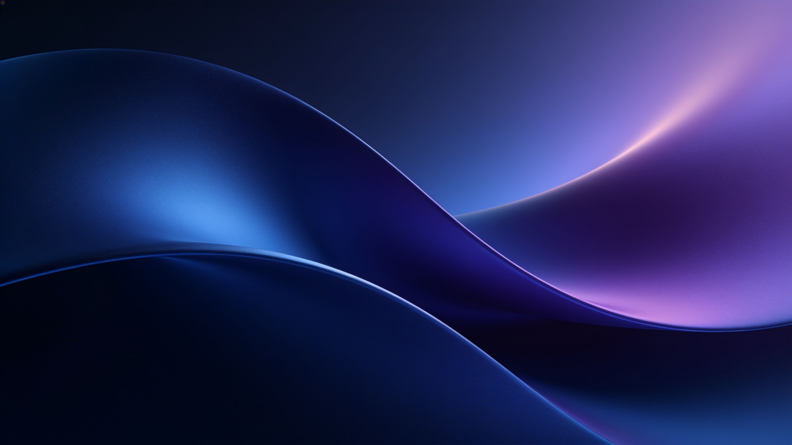 An abstract wallpaper featuring smooth, flowing waves in shades of blue and purple, creating a serene and elegant mood with a gradient transition from dark to light tones.