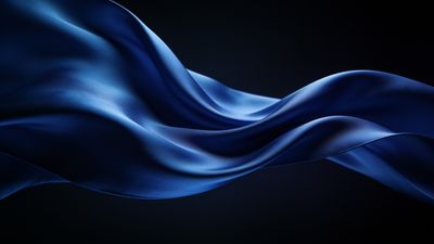A vivid 4K HD image of flowing blue silk fabric, gracefully draped and swirling against a dark background, creating a sense of elegance and fluidity. The rich texture and deep blue hues evoke a serene and luxurious mood.