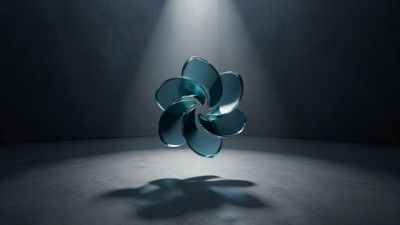 A teal, translucent glass sculpture shaped like a six-petaled abstract flower floats mid-air under a focused overhead spotlight in a dark, minimalist studio, its soft shadow stretching across the concrete floor. The dramatic lighting and smooth curves evoke a calm, futuristic mood.